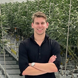 Timo Raus in a cannabis greenhouse