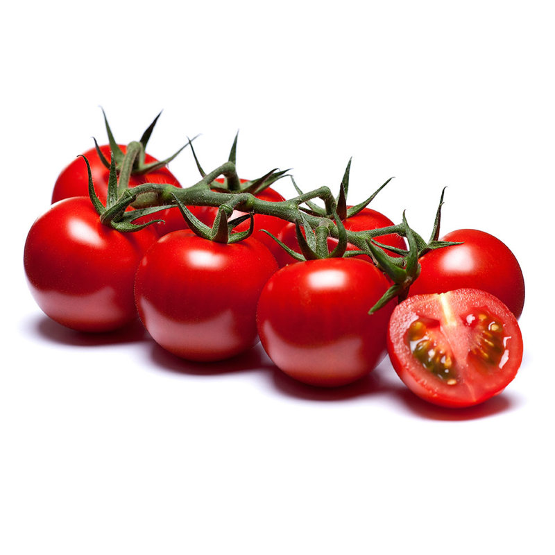 Sliced cocktail tomato showing firm, juicy flesh